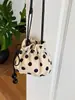 Bolso Cubo con Cordón de Lunares Transfronterizo 2026 Nuevo para Mujer, Bolso de Hombro Cruzado Versátil de Gama Alta, Moda de Nicho para Viajar
