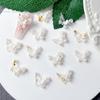 Nueva bolsa de material de flor de oro K blanco, joyería para uñas, flash luminoso, comodín, mariposa pequeña, suministros para arte de uñas al por mayor