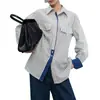 Pedido em Conjunto2026 Primavera Nova Camisa Casual Texturizada com Listras Color-Block e Design que Marca a Cintura para Mulheres