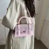 Bolso pequeño cuadrado elegante para mujer de otoño e invierno, bolso de mano casual de moda, bolso cruzado de diseño de nicho texturizado 2026