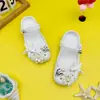 2026 Novo Verão Estrela do Mar Flor Branca Clogs de Balé Infantil Eva Outdoor Fechado Bico Chinelos de Praia Atacado