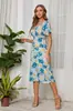 Amazon transfronterizo verano 2022 nuevo vestido estampado de cuello en V sin mangas de gasa con falda amplia vestido de playa para mujer en stock