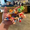 Novo Chaveiro Criativo de Menina Dormindo em Desenho Animado 3D Pingente de Bolsa Presente Pequeno para Casal Atacado