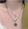 Collar de Doble Capa con Colgante de Cerezo Pequeña Flor Inspirado en Corea, Europeo y Americano, Transfronterizo, para Mujer con Diseño Creativo y Único