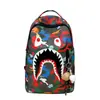 Mochila de tiburón con estampado de grafiti de moda transfronteriza, bolsa casual de gran capacidad para estudiantes commuters y escolares al por mayor