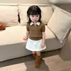 Estilo Coreano 2026 Verano Nuevo Top de Punto Retorcido con Cuello Polo Manga Corta Estilo Academia para Niñas Falda Blanca de Corte A