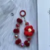 Nova Corrente de Chaveiro para Celular com Flor de Lã e Contas Pulseira de Pelúcia Fofa com Contas Acessórios para Bolsa Pingente Suprimento