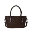 Bolso de tejido de alta gama de nicho para mujer, nuevo de 2026, moda retro versátil, bolso cruzado, bolso de mano, bolso tipo cubo