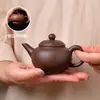 Tetera Yixing Zisha tamaño pequeño para Romper el Té Kung Fu Juego de Té traje Hogar Barro Zhu Xi Shi Antigua Hecha a mano Rompeaguas