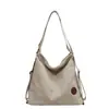 Bolso de axila de moda retro 2023 para mujer, nuevo bolso tote casual simple, bolso de hombro cruzado de nicho de moda