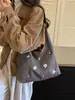 Bolsa de Lona Bordada Cartoon Casual Feminina 2026 Nova Bolsa Tote de Grande Capacidade Versátil para o Dia a Dia Bolsa de Ombro Único