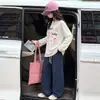 Outono de 2026 Estilo Casual Coreano Estampado Manga Longa Calça de Perna Larga Conjunto Feminino Emagrecedor Solto Fashionável Conjunto de Duas Peças