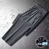 Calça Esportiva Masculina Fina de Seda de Gelo Calça Casual Atacado Tamanho Grande Calça Longa Masculina 2026 Nova Calça Longa Casual de Seda de Gelo