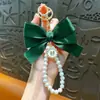 Chaveiro Pingente Laço Pérola Mais Vendido Criativo Colorido Fita Tecido Nó Acessórios Capa de Fone de Ouvido Decoração de Bolsa Fonte de Suprimentos