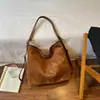 Bolsa de Mano Retro Estilo Coreano al por Mayor Bolsa Pequeña Bolso de Mujer Otoño 2026 Nuevo Color Sólido Bolso de Hombro Simple Mochila Versátil