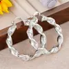 Pendientes de Oriente Medio al por mayor para mujer, Diseño de espiral de nicho, Joyería de moda, Joyería dorada brillante