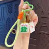 Chaveiro de gatinho de mahjong em desenho animado fofo, símbolo de sorte, cordão trançado, pingente de bolsa, decoração divertida, atacado