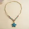 Collar de corazón de madera estilo resort europeo y americano con cuentas de estrella de mar, cadena para suéter personalizada de nicho transfronteriza, collar de alta gama para mujer