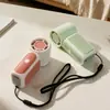 Nuevo modelo de mini ventilador portátil de mano para viento fuerte con correa, 5 velocidades, diseño elegante, batería de larga duración, ventilador de escritorio recargable por USB