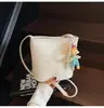 Bolsos de Hombro de Moda Transfronterizos para Mujer Este Año, Nuevos Bolsos Versátiles Casuales de Axila 2026, Bolsos Cruzados de Cubo Estampados