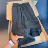 Calça jacquard com estampa escura estilo retrô americano para homens, marca da moda outono, calça casual solta com bom caimento, perna reta levemente alargada