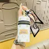 Nova bolsa de balde criativa chaveiro de couro para presbiopia cilindro armazenamento de batom mini bolsa de armazenamento portátil atacado
