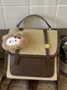 Bolsa de Nicho Nueva de Invierno 2025 Mochila de Moda Portátil para Mujer Mochila Escolar Coreana Mochila de Viaje Retro