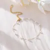 Pulseira de nariz de porco da moda, corrente minimalista de alta qualidade, pulseira de pérolas, design de nicho, luxo leve, versátil, joias de comércio exterior europeias e americanas