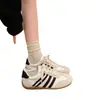 Zapatos de comercio exterior Zapatos de entrenamiento alemanes para mujer 2026 primavera nuevo estilo suela blanda casual Zapatos Forrest Gump versión coreana retro zapatillas deportivas de tabla