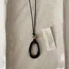 Nuevo Collar con Colgante Oval Hueco Estilo Chino para Mujer, Lujo Ligero, Cadena Larga para Suéter Halter de Nicho de Gama Alta