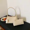Bolsa de mão com design exclusivo para mulheres, novo modelo 2026, bolsa de ombro única, transversal, de axila, sensação de luxo, bolsa de palha tecida para segurar na mão para mulheres