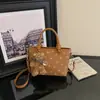 Bolsa de ombro estampada estilo retrô, uma bolsa de mão estilosa e única, perfeita para o trabalho, o trajeto diário ou o uso casual.; também uma bolsa transversal versátil e uma bolsa de balde casual