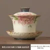 Nuevo Estilo Azul y Blanco Rojo Firestone Dorado Pintado Orquídea Peonía Juego de Té Kung Fu Cerámica Tres Piezas Tazón con Tapa para Uso Doméstico Tazón para Preparar Té Venta al por Mayor