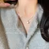 Colar de pérolas estilo Ins feminino luxo leve nicho corrente clavícula alta qualidade doce cool hot girl pingente amor joias atacado
