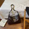 Shuai Mijia 2026 Outono Novo Estilo Coreano Casual Simples Bolsa de Ombro Único Moda Chique Bolsa de Axila Bolsa Transversal de Nicho