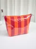 Bolsa de Maquillaje Impermeable de PVC de Nuevo Modelo Transfronteriza para Mujer, Neceser Rayado de Gran Capacidad, Bolsa de Almacenamiento de Viaje Versátil de Alto Valor