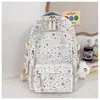 Mochila nueva de estilo comercio exterior para niñas, adecuada para estudiantes de secundaria y preparatoria, con gran capacidad y diseño de estampado de estrellas; también una mochila para computadora para estudiantes universitarias