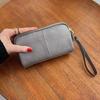 Bolso Clutch de Cuero Genuino para Mujer 2025 Nuevo Estilo Simple Casual Cremallera Textura Bolso Pequeño Venta al Por Mayor Billetera de Cuero Vacuno de Primera Capa para Mujer