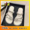 2025 Nuevo Verano Mariposa Pedrería Brillante Ropa Exterior Pantuflas Planas para Mujer Versátil Estilo Hada Sandalias Dos Usos para Mujer