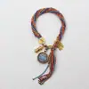 Cuerda de mano tejida a mano thangka de Xizang ocho santos patrones thangka cuerda de mano tejida a mano cuerda de mano de hilo de algodón multicolor marea nacional