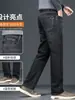 Nuevos pantalones vaqueros gruesos para hombre para otoño e invierno 2026, estilo recto holgado, adelgazantes y que realzan la altura, pantalones largos elásticos lavados