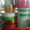 Máquina envasadora bolsa té tela no tejida PET película compuesta transparente papel filtro empaque película de papel de aluminio fabricante