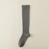 Calcetines de yoga para pantorrillas para adelgazar y alargar, calcetines de caña alta, calcetines de compresión deportiva para pantorrillas, calcetines específicos para correr, venta al por mayor desde Zhuji