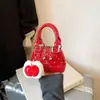 Bolso Único de Lunares 2026 Primavera Nuevo Elegante Bolso Concha Moderno Cruzado Bolso para Labiales para Salir