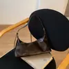 Bolsa feminina 2026 novo modelo bolsa feminina niche coreana com toque de luxo, bolsa de ombro/axila simples e versátil para o dia a dia, bolsa transversal