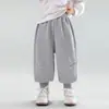 Otoño 2026 Nuevo Estilo Versión Coreana Versátil para Niños Pantalones Deportivos Casuales con Letras Sueltos Primavera y Otoño Pantalones Deportivos para Niños