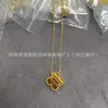 Versión Alta V Oro Collar de Trébol de Cuatro Hojas para Mujeres Diseño de Nicho Lujo Ligero Ágata Roja Flor de Nácar Cadena para Clavícula Venta al por Mayor de Fábrica