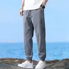 Pantalones casuales de seda de hielo de secado rápido para hombre 2025 nuevos pantalones deportivos transpirables para niños verano finos sueltos con puño
