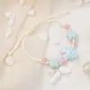 Jingdezhen Navidad Pulsera de Cuerda Trenzada de Cerámica Pulsera de Trébol de Cuatro Hojas Joyería Artística Hecha a Mano Venta al por Mayor Pulseras de Cerámica para Atracciones Turísticas