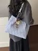 Bolso de mano simple para mujer 2026 nuevo modelo, lindo bolso tote para mujer, bolso de hombro para commuting de nicho de gran capacidad, bolso de mano versátil